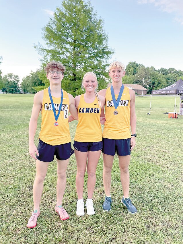 HEADED TO STATE – From left: Kade Johnson, Sadie Fry, and Pete Douglas. Johnson and Douglas, both wearing medals won in their West Sectional races, will compete in the state meet on May 20 in Murfreesboro.