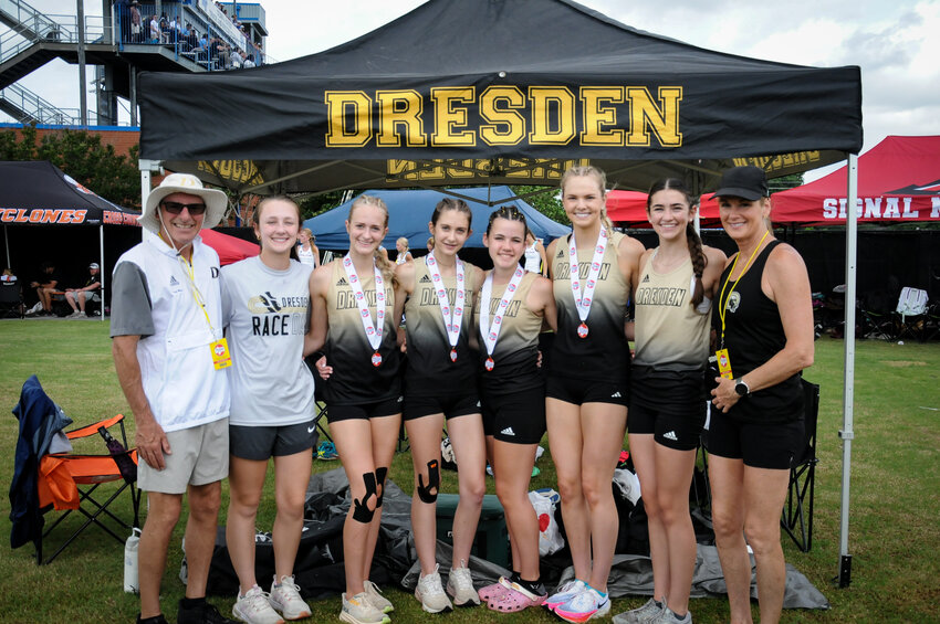 Coaches Todd and Wendi Maxie with 4x800
meter relay team