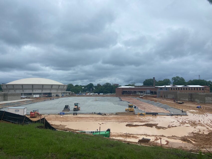 The footprint of the football field and some of the other amenities surrounding it at the new Jackson Central-Merry football stadium are beginning to take shape next to Oman Arena and the building that will be the new Jackson-Madison County Schools Central Office (former Jackson High and Madison Academic building) on May 28.