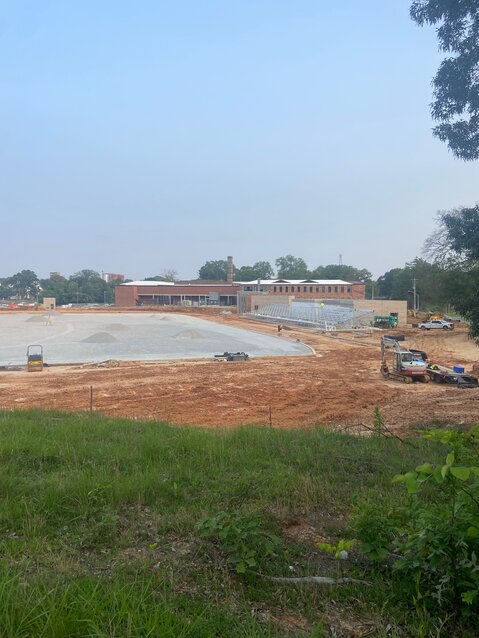 This image from Tuesday evening, June 10, 2025, shows the visitors’ bleachers at Jackson Central-Merry’s football and track stadium were being installed. The TSSAA/college regulation eight-lane track’s outline can be visible between the football playing surface and the stands.