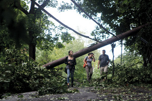 A group makes their way down West 231st Street near Palisade Avenue on Aug. 28, in the aftermath  of Tropical Storm Irene.