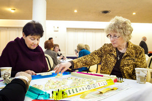 Carole Feinerg and Dorothy Feldman participate in a game of Mah Jongg on Sunday during the Riverdale Temple Women of Reform Judaism&rsquo;s annual card party at the Riverdale Temple.