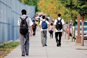 Students walk down Tibbett Avenue on the first day of school in September 2010.