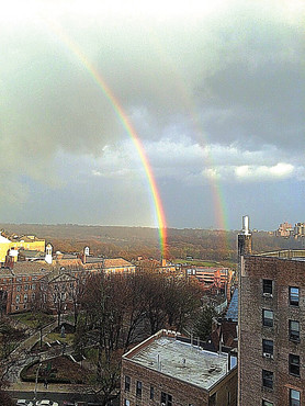 Rain gives way to a pair of iridescent arcs above Manhattan College&rsquo;s campus.