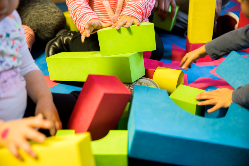 Children play with blocks at Rodi Daycare Center. Child care is often expensive, but U.S. Sen. Kirsten Gillibrand is hoping to mitigate some of that with legislation aimed at making it more affordable for students who have children.