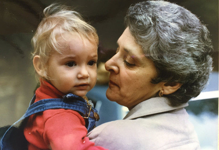 Muriel &lsquo;Mickey&rsquo; Axelbank holds her granddaughter Rachel in an undated family photo. She was widely mourned following her death from complications related to COVID-19.