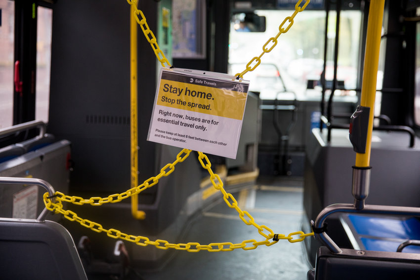 A sign hangs in front of a roped-off section of a bus informing passengers that buses citywide are for essential travel only. The city&rsquo;s bus network is one of the hardest hit areas of the MTA since the advent of the coronavirus pandemic, which has seen ridership plummet. Mayor Bill de Blasio has decided to defund the Better Buses Action Plan, intended to speed up bus service.