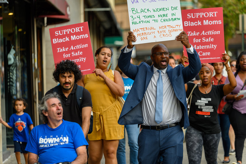 Jamaal Bowman, center right, participates in a march last September as part of his campaign to unseat U.S. Rep. Eliot Engel in the upcoming Democratic primary. Of all of Engel&rsquo;s challengers, Bowman has raised the most money.