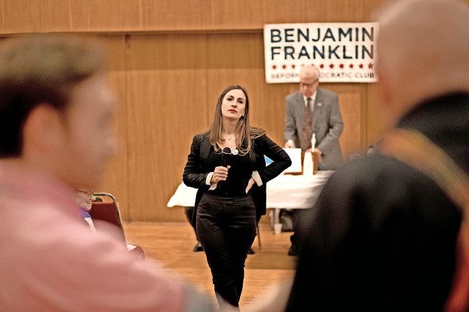 Alessandra Biaggi listens to an audience member's question at a 2018 endorsement meeting of the Benjamin Franklin Reform Democratic Club. Biaggi is leaving the political club to start a competing one.