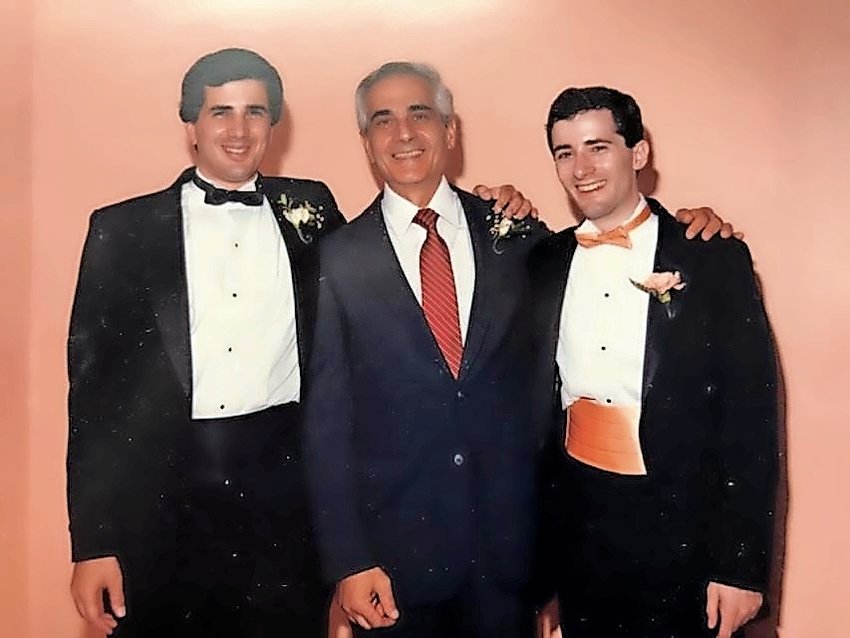 Marc Attar, here with sons Michael, left, and Alan.