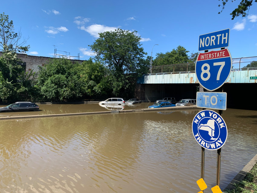 Large sections of the Major Deegan Expressway was shut down through Kingsbridge after massive flooding turned the expressway into river. Cars, trucks and even tour buses were abandoned along the way.