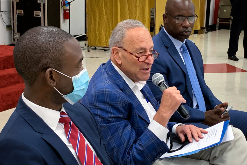 U.S. Senate Majority Leader Chuck Schumer pushes to make monthly child poverty payments that started under the American Rescue Plan permanent in a Yonkers town hall that included U.S. Treasury Department deputy secretary Wally Adeyemo, left, and U.S. Rep. Jamaal Bowman.