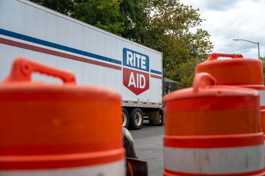 A Rite Aid merchandise truck parked outside the Knolls Crescent location.