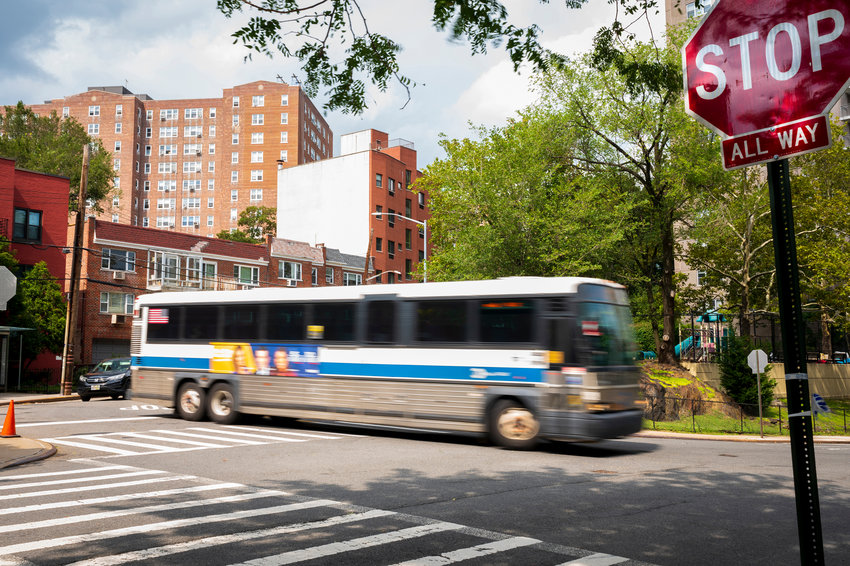 An MTA express bus shoots around the corner at the intersection of Kappock Street and Johnson Avenue, the Spuyten Duyvil intersection where political activist Ruth Mullen was killed last September. Lawmakers have since pushed for the city&rsquo;s transportation department to install a traffic light, and make other safety improvements there.