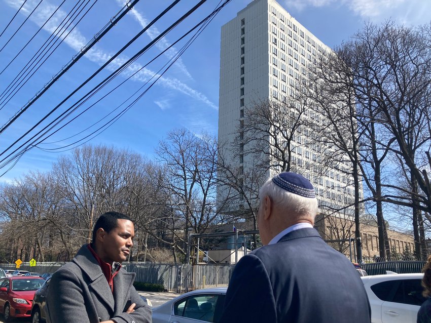 U.S. Rep. Ritchie Torres, left, meets with Rabbi Avi Weiss outside of the Russian Mission compound on North Riverdale's Mosholu Avenue. Torres wants the FBI to investigate whether the diplomatic residential complex that towers over the Riverdale Library and the Riverdale Neighborhood House.