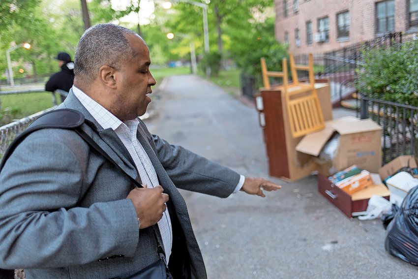 Tony Edwards, the president of the Marble Hill Resident Council, talks about how tenants are not supposed to just dump garbage outside their building. Edwards is leading a neighborhood cleanup to get rid of the garbage, the third he has led.