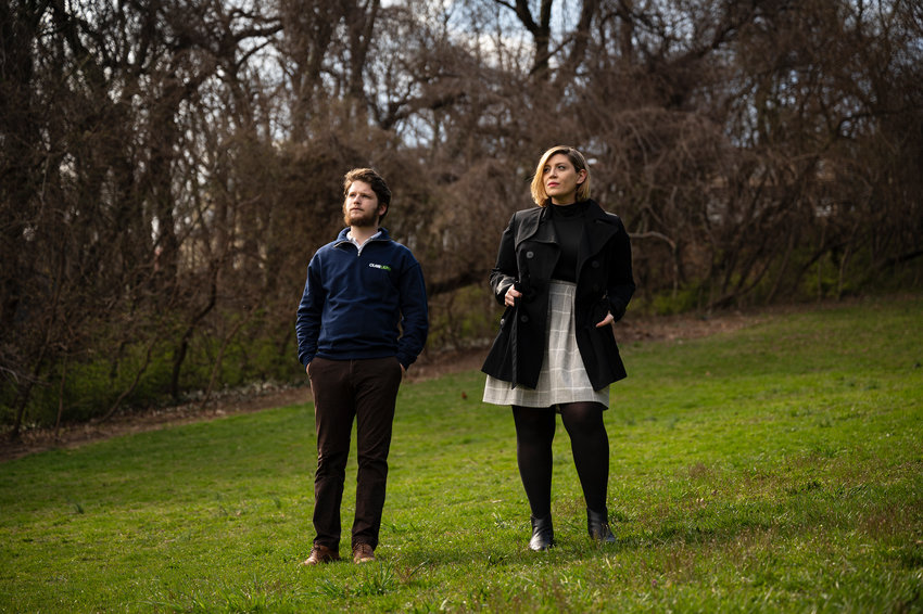 Shabbos Kestenbaum and  Lauren Calihman, who met up in Poland by chance during the Ukrainian refugee crisis, pose for a portrait in Ewen Park on April 4, 2022.