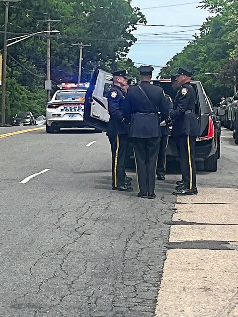 Fellow New York Police Department officers take part in the funeral of retired Lt. Ivan Gonzalez of the 49th Precinct on May 25. Riverdale on Hudson Funeral Home handled the wake and funeral. Some of his colleagues were pallbearers and the color guard saluted him on Riverdale Avenue.