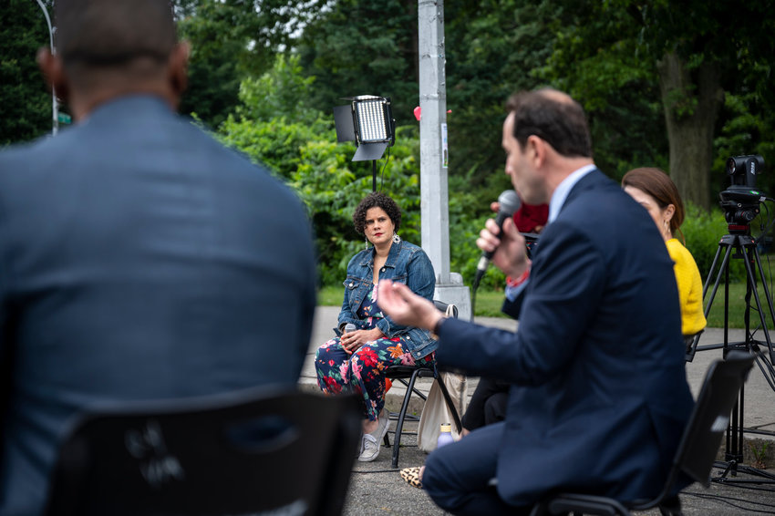 Mino Lora, center, shown during a past debate at forum hosted by The Riverdale Press and BronxNet, is excited the city has decided to spend $15 million to help her organization build a cultural center and theater in Inwood.