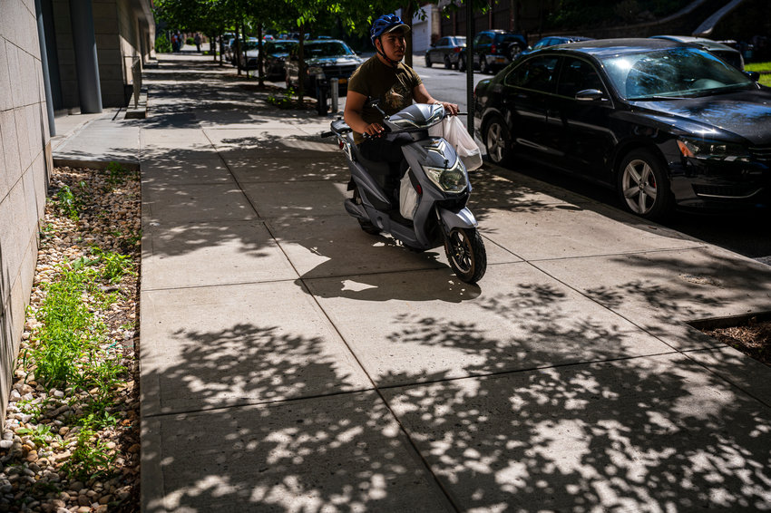 Residents hear the noise of scooters and other delivery vehicles zip past them on a beautiful path in front of Manhattan College&rsquo;s Kelly Commons. They first became a problem in 2020 during the pandemic.