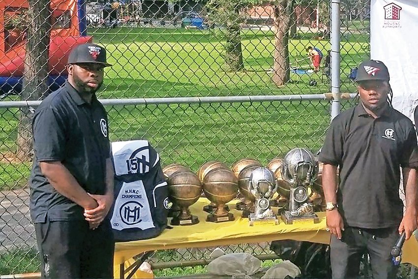 Norman Green, left, and his younger brother Isaiah, right, are co-organizers of the Marble Hill New Era Classic. The brothers assumed head duties in 2015 after the tournament took a two-year hiatus. Now, they are back and better than ever serving their community through the game of basketball.