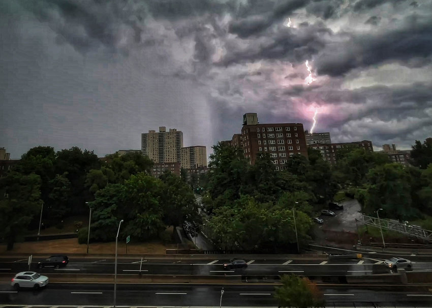 A lightning bolt strikes the top of 555 Kappock St. early Monday morning as thunderstorms hit greater Riverdale and the New York City metropolitan area. The severe weather continued for most of the day, leading to flash flooding on the Major Deegan Expressway and other nearby highways.