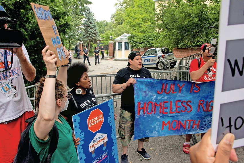 Formerly homeless New Yorkers, now advocates for those facing the same plight, marched to Gracie Mansion with a plea for an end to city street sweeps. &ldquo;All of our cries on deaf ears!&rdquo; one demonstrator cried, her shouts echoing through the gates of the empty mansion as NYPD officers stood guard on Sunday, Jul. 17.