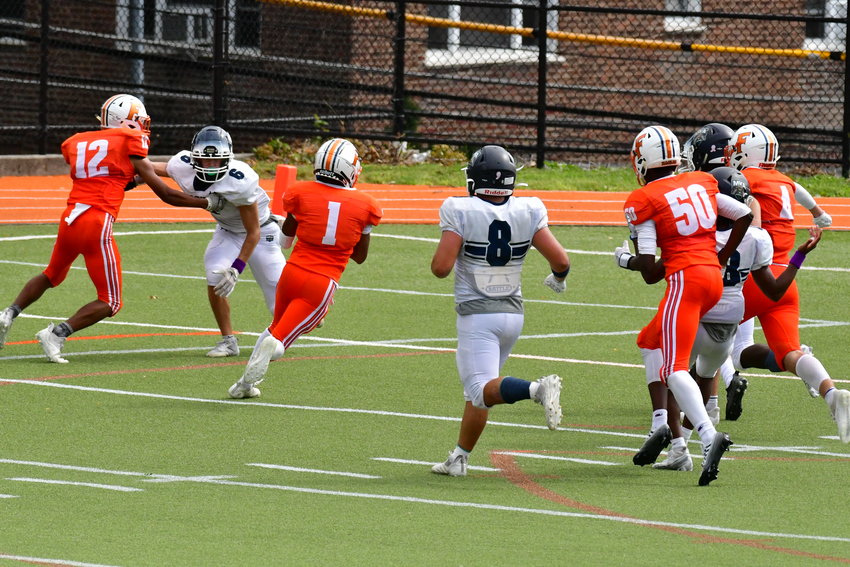 Fieldston Eagles senior Jaden Mena finds an open hole en route to a TD reception in Saturday&rsquo;s 20-13 non-conference loss to Montclair Kimberley Academy.