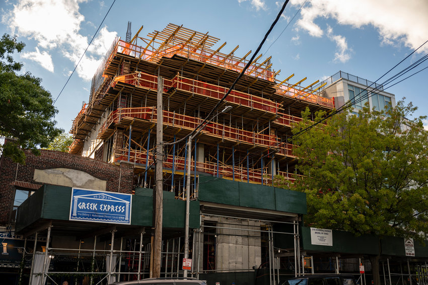 A 14-story apartment building continues to rise at 3745 Riverdale Ave. on Sept. 28. Construction resumed this summer after the Stagg Group addressed issues that led to a stop work order last spring.