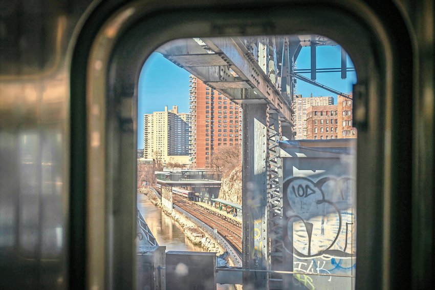 Metro-North Railroad train races past Marble Hill station, pictured from a northbound 1 train on Monday morning, Jan. 16.