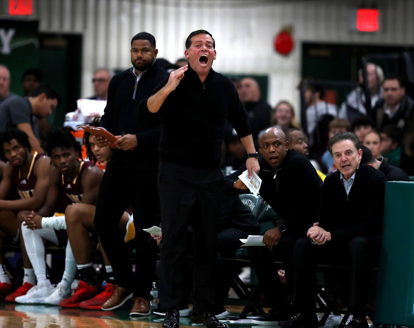 Former Manhattan head coach Steve Masiello yells out instructions to Iona players during the Gaels&rsquo; 84-76 win over the Manhattan Jaspers on Friday night.