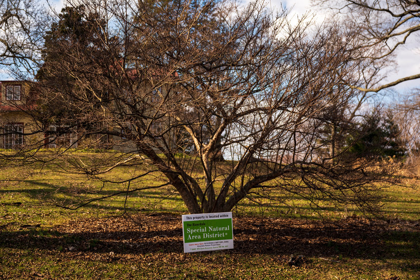 Riverdale Nature Preservancy&rsquo;s lawn signs, such as this one at 5501 Palisade Ave. on  Feb. 6, are dotted throughout the special natural area district.