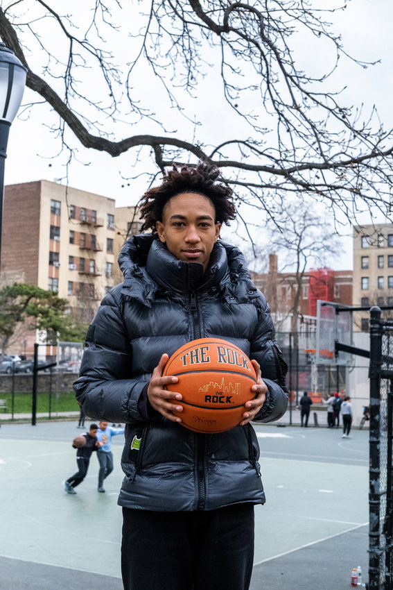 Jomauri Pe&ntilde;a holds the &ldquo;rock&rdquo; at a basketball court recently as he tell his story about how he wound up playing for DeWitt Clinton High School boys basketball team and earning All-State honors.