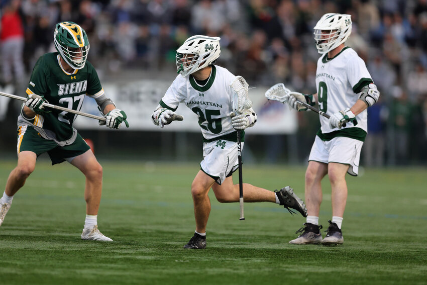 Manhattan sophomore attacker Scott O'Connor carries the ball against fourth-seeded Siena Saints in a semifinal matchup of the Metro Atlantic Athletic Conference Championships on May 4.