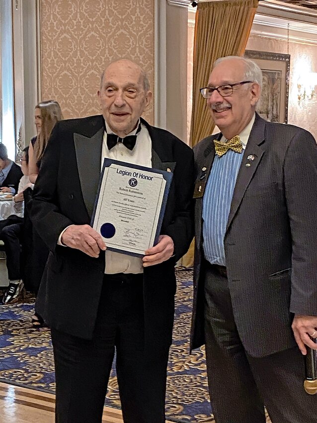 Bob Rubinstein, known for his work on the Riverdale Kiwanis club volunteer efforts and a founder of the Benjamin Franklin Reform Democratic Club, is given a Legion of Honor award by New York state Kiwanis Club governor Joel Harris at the club&rsquo;s annual gala celebrating its 70th anniversary.