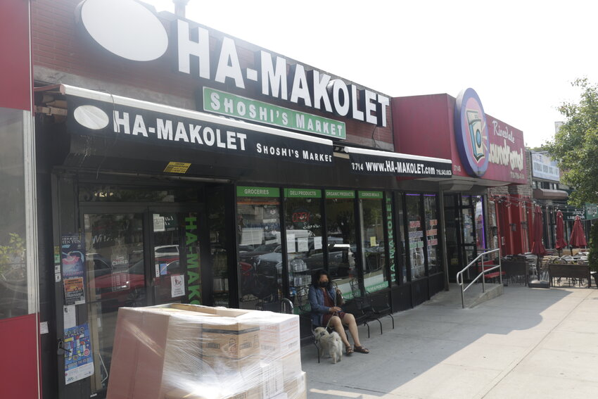 A woman reported her wallet was stolen while she was shopping at Ha-Makolet Shoshi's Market on Riverdale Avenue on April 28.