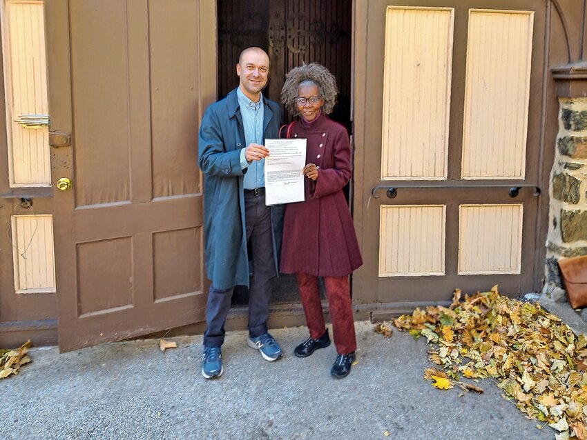 Kingsbridge Historical Society President Nick Dembowski and the church&rsquo;s general committee chairperson Carolyn Abernathy in front of the Edgehill Church when the society purchased the church last year.