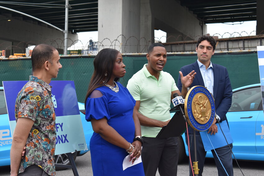 U.S. Rep. Ritchie Torres, shown with, from left, Arif Ullah, executive director of South Bronx Unite; borough president Vanessa Gibson; and Frank Reig, chief executive of Revel. That is the Brooklyn-based company that will supply the charging stations. The congressman announced Monday the construction of a superhub at 799 E. 14oth St. in Port Morris for charging electric vehicles. The hub will have about 30 direct current fast charging chargers that will be able to charge an EV with 100 miles range in just 10 minutes.