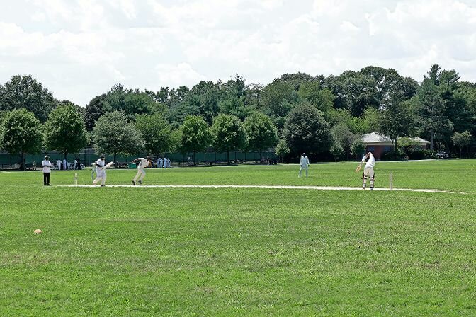 A cricket game at Van Cortlandt Park on July 25, 2023. The season for cricket players usually starts in April and ends in mid-October. However the proposed construction of a 34,000-seat stadium would cut into the season.
