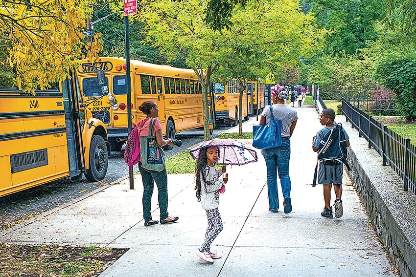 Students from P.S. 81 in Riverdale leave school to board their buses during a strike-free year. This year   some 9,000 school bus drivers could walk off the job before the start of the academic year Sept. 7 if the city&rsquo;s education department and the union that represents the drivers don&rsquo;t come to a new contract agreement in time.