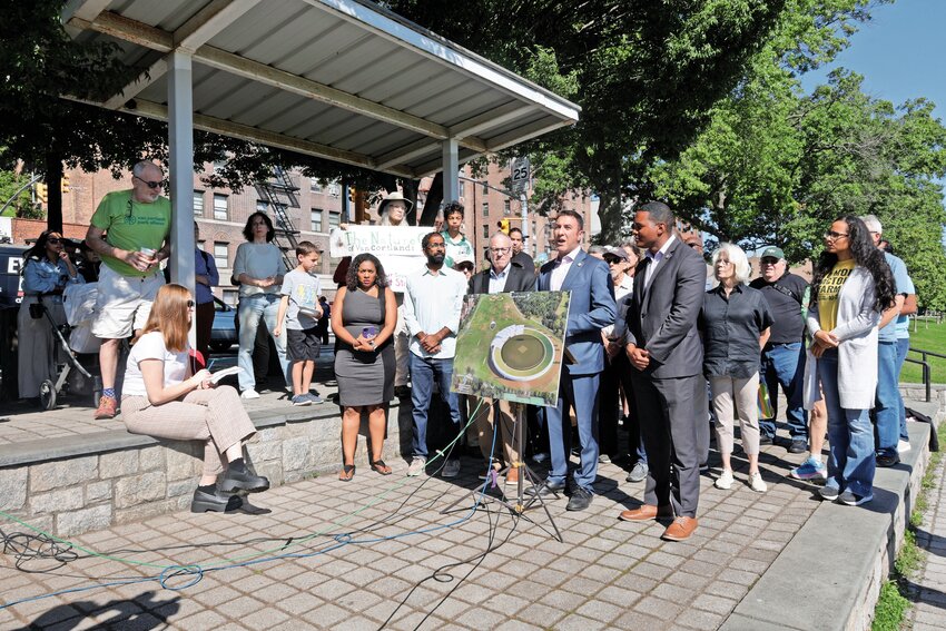U.S. Rep. Ritchie Torres, Councilman Eric Dinowitz and Assemblyman Jeffrey Dinowitz earlier this month stand in front of the proposed rendering of a modular cricket stadium that was slated for Van Cortlandt Park before the International Cricket Council chose Eisenhower Park on Long Island as the venue for the 2024 Men's T20 World Cup.