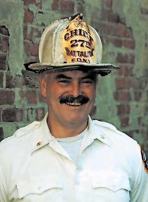 John Bruckner graduated from Manhattan College in 1974 and thought he would stay in education as a school teacher. However, a change of heart led him to the FDNY and gave him a home at Battalion 27 in the Bronx as part of a career that spanned multiple decades before his retirement in 2002.