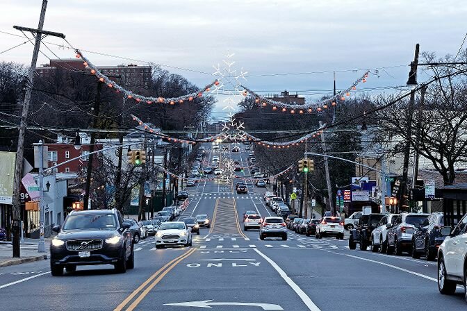 The annual Christmas lights adorn Riverdale Avenue Tuesday as North Riverdale merchants and community prepare for the upcoming holiday.