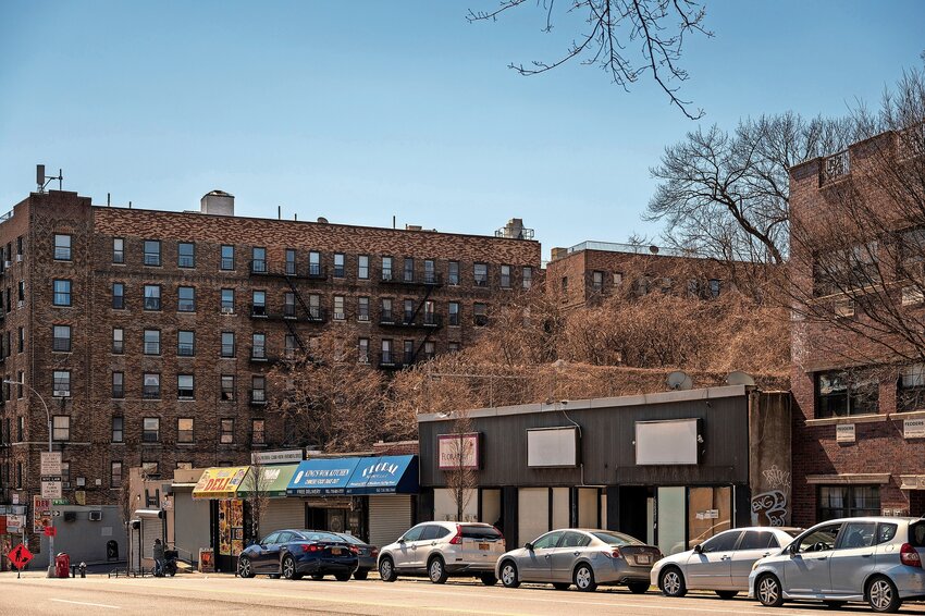 Businesses and shuttered shops along the 6600 stretch of Broadway in North Riverdale on Monday, March 13, 2023. That site and a vacant lot around the corner were sold for $4.8 million last month to a company representing WestHab Inc., the homeless shelter operator for the site.
