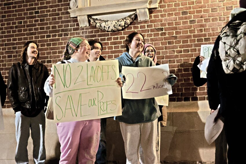 Students and professors last month rally in support of those tenured professors from Manhattan College who face buyouts as part of a cost-cutting measure by the school.