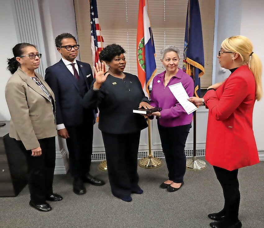 Bronx District Attorney Darcel Clark takes the oath of office before Bronx County Clerk Ischia Bravo on Jan. 3. Clark, who has begun her third term, was joined by chief of staff Odalys Alonso, chief assistant district attorney Derek Lynton and executive assistant Evangeline Vargas.