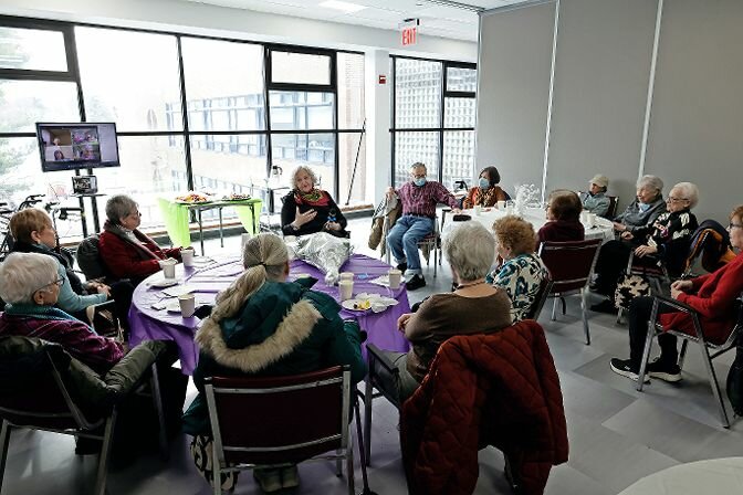 Members of the monthly book club New Beginnings, at the Center for Contemporary Adults 60+ at the Riverdale Y, celebrated reading 100 books on Jan. 18. Members read their 100th book, &lsquo;The Magician,&rsquo; by Colm T&oacute;ib&iacute;n, in December.