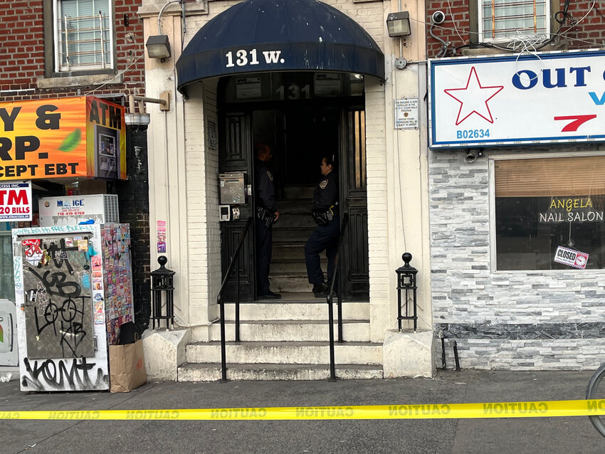 Police in front of 131 W. Kingsbridge Road where Hasan Richburg, 26, of Kingsbridge was fatally shot multiple times around 11 a.m. Thursday, according to DCPI.