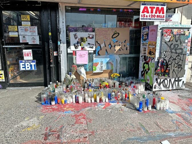 Candles and flowers set outside 131 W. Kingsbridge Road in memory of 26-year-old Hasan Richburg, who was fatally shot in Kingsbridge Heights on Feb. 8. Deshaun Coleman, who was recently released on parole for good behavior, was arrested on Valentine&rsquo;s Day and charged with both murder and criminal possession.