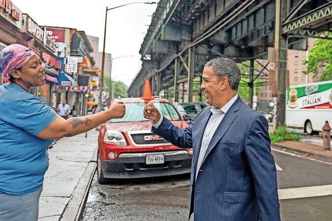 United States Representative Adriano Espaillat greets constituents in Marble Hill on Monday, August 1, 2022.